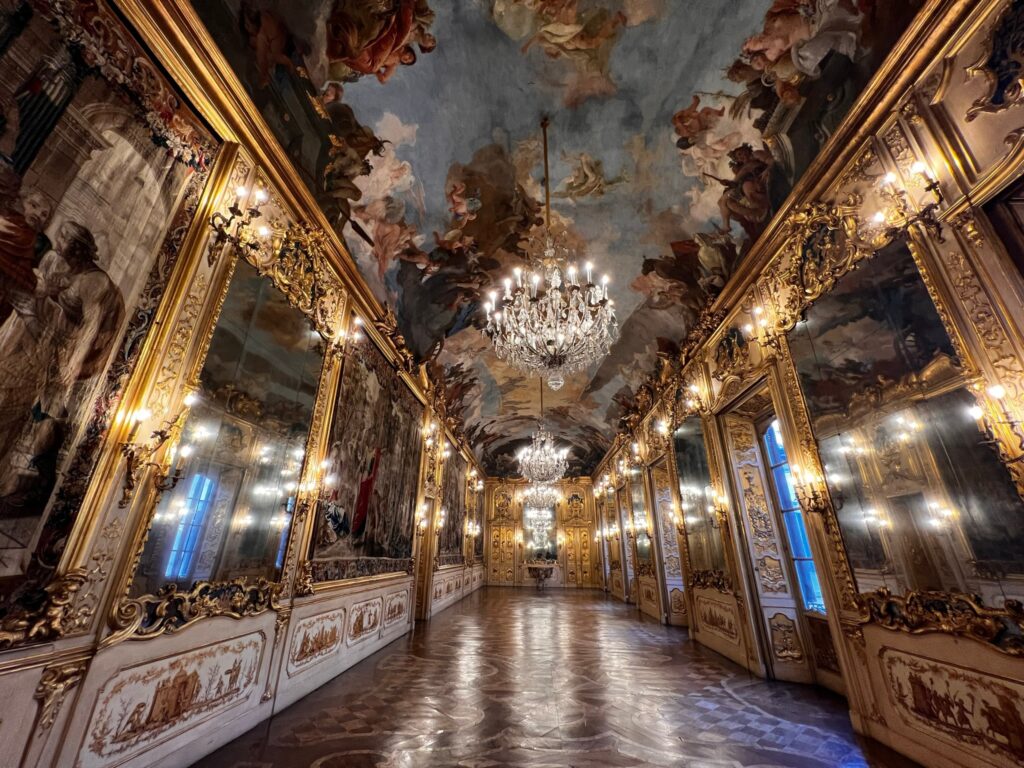 Historic Milan palazzo interior during Milan Design Week hosting luxury fashion house installations and immersive design / the Maisons the maisons The Maisons — When Fashion Takes Over the City Milano Palazzo Clerici Orizzontale 1024x768 1