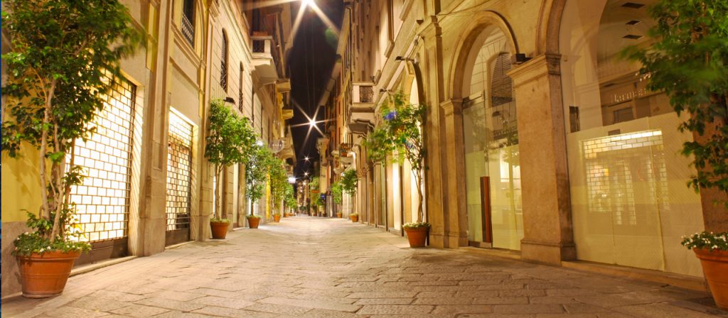 Quadrilatero della Moda street in Milan during Design Week with luxury boutiques and fashion district atmosphere / the Maisons the maisons The Maisons — When Fashion Takes Over the City VieModaSpiga DP 1280x560 1024x448